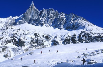 France, Haute Savoie, Chamonix valley, skier on Mer de glace at the foot of Aiguille verte in the Vallee Blanche, Mont Blanc