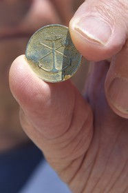 France, Bouches du Rhone, Marseille, Calanques National Park, archipelago of Frioul islands, Ratonneau island, local coin of the owners of the quarry allowed minting their own money and valid only on the Frioul