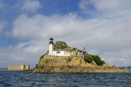 France, Finistere, Morlaix bay, Carantec, lighthouse of Louet island (also a guest house in summer) and the Chateau du Taureau