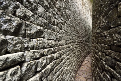 Zimbabwe, Masvingo province, the ruins of the archaeological site of Great Zimbabwe, UNESCO World Heritage List, 10th-15th century, the Great Enclosure, narrow passageway between two walls