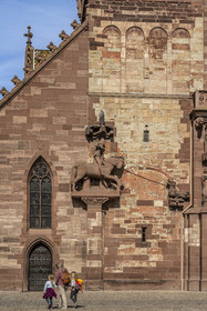 Switzerland, Basel, the Minster or Protestant Cathedral of Our Lady of Basel (Munster), the facade presents a sculpture of Saint George slaying the dragon