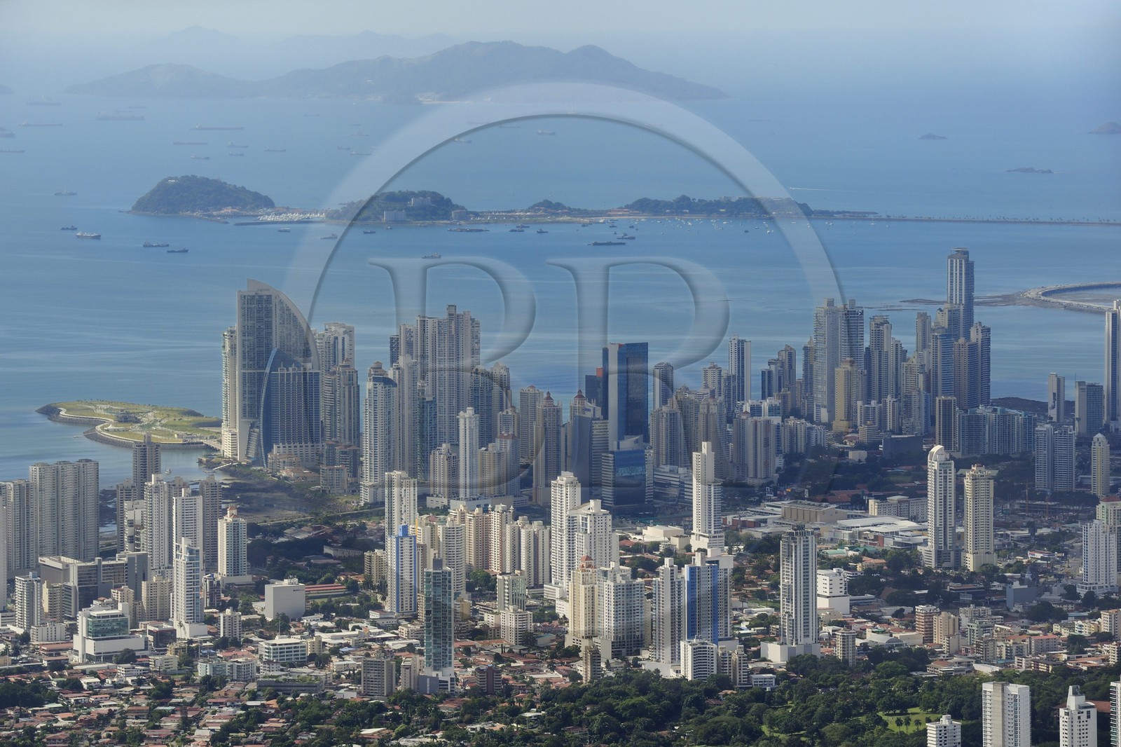 Panama, Panama City skyscrapers the Causeway Islands (Calzada de Amador) in the background (aerial view)