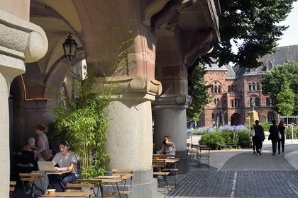 France, Moselle, Metz, Imperial district, Cafe terrace and former central  post office, neo-Romanesque building built in 1905, in the background