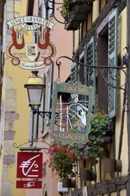 France, Haut Rhin, the Alsace Wine Route, Turckheim, restaurant sign on Grand Rue