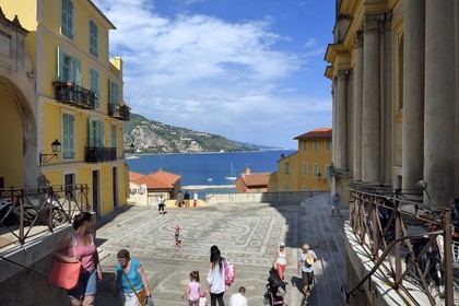 France, Alpes-Maritimes, Menton, old town, the parvis Saint-Michel and the basilique Saint Michel Archange (Saint Michael the Archangel Basilica) right