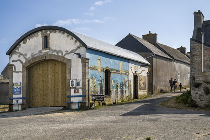 France, Finistère, Iroise Sea, Molene Island, the port, the shelter of the former rowing lifeboat Amiral Roussin from 1894 to 1950 covered with frescoes painted by Laurent Mordelet which retrace the life and history of the island