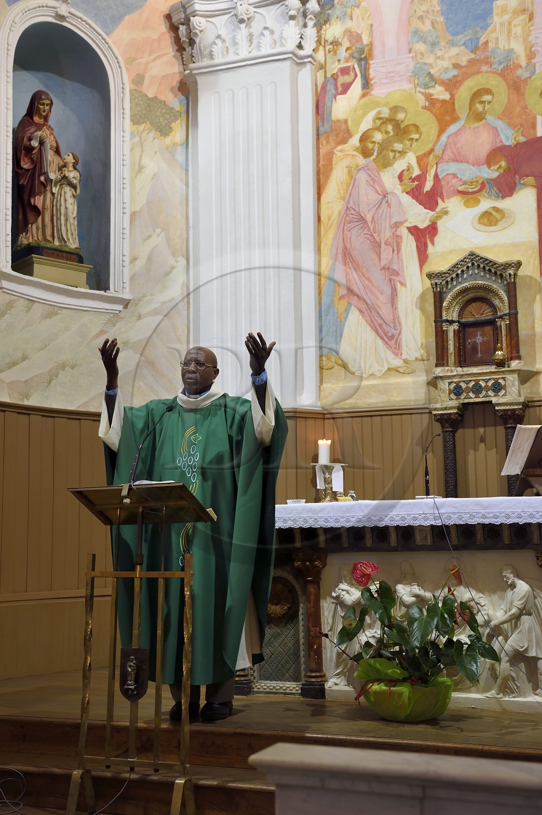 France, Corse du Sud, Cargese, catholic church (latin rite) built in the 19th century, the priest of Rwandese origin Edouard Sentarure at Sunday Mass