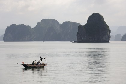 Vietnam, Quang Ninh Province, Halong Bay, listed as World Heritage by UNESCO, fishing boat