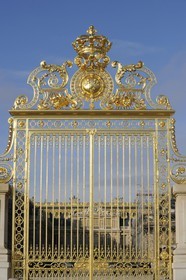 France, Yvelines, Chateau de Versailles, listed as World Heritage by UNESCO, detail of the Royal Gate drawn by Mansart (restored in June 2008) which separating the Royal Courtyard