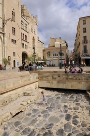 France, Aude, Narbonne, Place de l'Hotel de Ville, remains of the Via Domitia at the bottom of Palais des Archeveques (the Archbishops Palace)