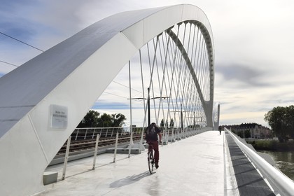 France, Bas Rhin, Strasbourg, the pedestrian, bicycle and the tram line D bridge over the Rhine river connecting Strasbourg to Kehl in Germany inaugurated on 28 April 2017 called Beatus Rhenanus bridge