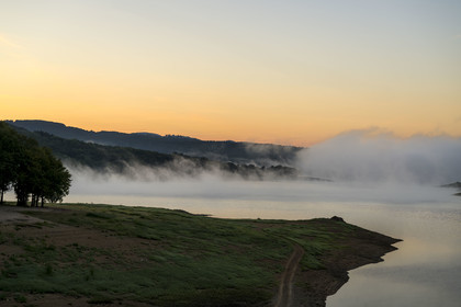 France, Nievre, Regional Natural Park of Morvan, Chaumard, Pannecière lake in the early morning mist