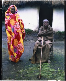 Burundi, Bujumbura Province, Ijenda area, Tutsi pastoralists old couple in front of their hut (4x5 reversal film reproduction)