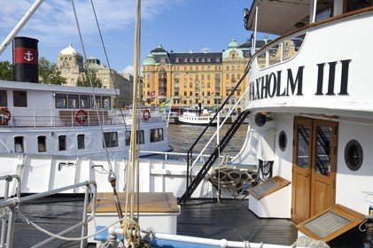 Sweden, Stockholm, Norrmalm city center district, ferries moored at the Nybrokajen quay