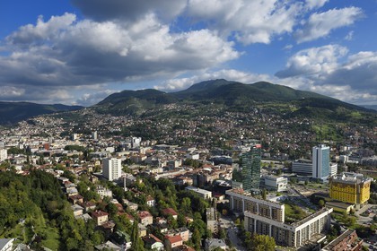 Bosnia and Herzegovina, Sarajevo, modern city in the foreground right and the old city in the background left