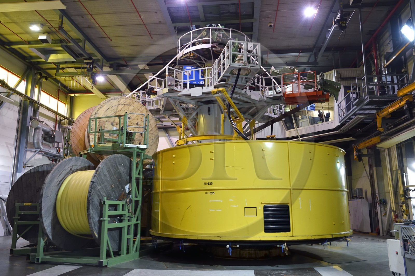 Norway, Ostfold County, Halden, Nexans cable manufacturing plant, braiding of several high-tech cables