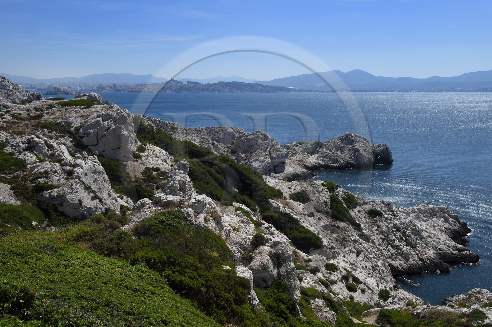 France, Bouches du Rhone, Marseille, Calanques National Park, archipelago of Frioul islands, Pomegues island and the Marseille skyline in the background