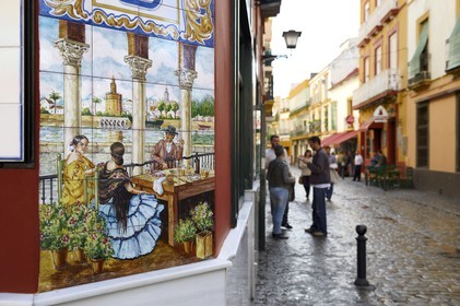 Spain, Andalusia, Seville, Triana district, azulejos representing Seville seen from Triana on the facade of the bar Las Columnas in the calle Rodrigo de Triana