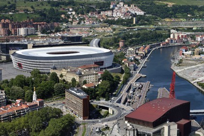 Spain, Basque Country, Biscay Province, Bilbao, the San Mamés Stadium (2013) by architect Norman Foster and the Euskalduna Palace (Palace of Congresses and Music) right next to the Ria de Bilbao