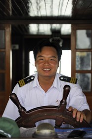 Vietnam, Quang Ninh Province, Along Bay, listed as World Heritage by UNESCO, capitaine of a chinese cruse junk