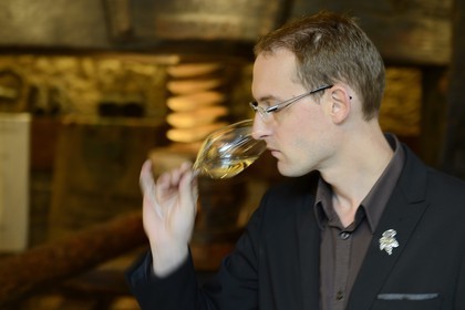 France, Bas Rhin, the Alsace Wine Route, Mittelbergheim, labelled Les Plus Beaux Villages de France (The Most Beautiful Villages of France), in the Domaine Wittmann wine cellar, Romain Iltis, Best Sommelier of France in 2012