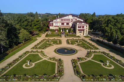 France, Pyrenees Atlantiques, Basque Country, Cambo les Bains, the Villa Arnaga and its French-style garden, the French author Edmond Rostand's house of neo-basque style and museum (aerial view)
