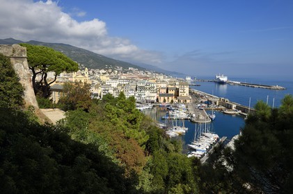 France, Haute Corse, Bastia, a tower from the Citadel left and the harbour overlooked by St Jean Baptiste Church on the right