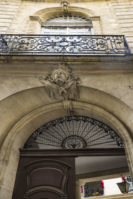 France, Herault, Montpellier, historic center called the Ecusson, mascaron representing Hercules on the facade of the Hotel Baschy du Cayla, an 18th century private mansion