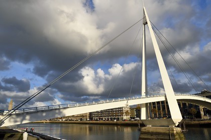 France, Seine Maritime, Le Havre, Downtown rebuilt by Auguste Perret listed as World Heritage by UNESCO, the footbridge of the Bassin du Commerce and the St. Joseph's Church in the background