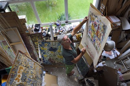 France, Finistere, Lannilis, Prat Ar Coum, the artist Loic Madec in his workshop