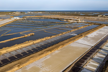 Portugal, Algarve, Tavira, the salt marshes on the edge of the city and the Ria Formosa Nature Park (aerial view)