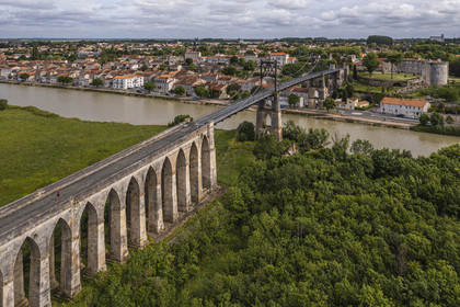 France, Charente-Maritime, Saintonge, Tonnay Charente, the suspension bridge built in 1842 over the Charente river (aerial view)