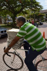 Panama, Panama City, historic town listed as World Heritage by UNESCO, Casco Antiguo (Viejo), newspaper deliveryman on plaza Tomas Herrera