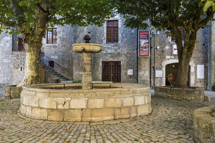France, Aveyron, Causses and the Cévennes, cultural landscape of Mediterranean agro-pastoralism, listed as World Heritage by UNESCO, Sainte-Eulalie-de-Cernon on the road to Santiago de Compostela, Place de la Fontaine in front of the Templar Commandery then Hospitaller and residence of the Commander of the Templars