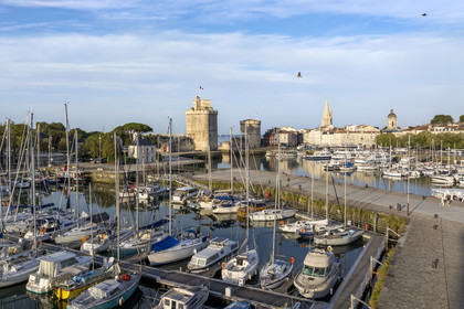 France, Charente Maritime, La Rochelle, the Old Port, Tour Saint Nicolas and Tour de la Chaine protect the entrance to the Old Port, the tour de la Lanterne in the background (aerial view)
