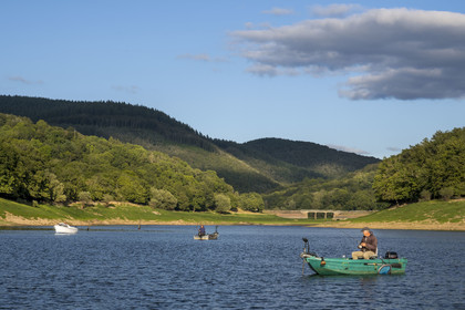 France, Nievre, Regional Natural Park of Morvan, Chaumard, Pannecière lake, fishing on a boat