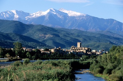 France, Pyrenees Orientales, Ille sur Têt village and Canigou peak in Riberal
