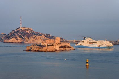 France, Bouches du Rhone, Marseille, Calanques National Park, archipelago of Frioul islands, La Meridionale Ferry arriving from Corsica and the Chateau d'If in the foreground