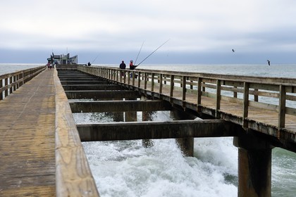 Namibia, Erongo region, Swakopmund seaside resort founded in 1892 by German settlers, fishermen on the jetty