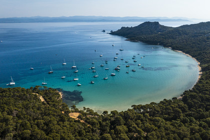 France, Var, Iles d'Hyeres, Parc National de Port Cros (National park of Port Cros), Porquerolles island, Notre-Dame beach in the Bay of Alycastre and the Cap des Medes in the background (aerial view)