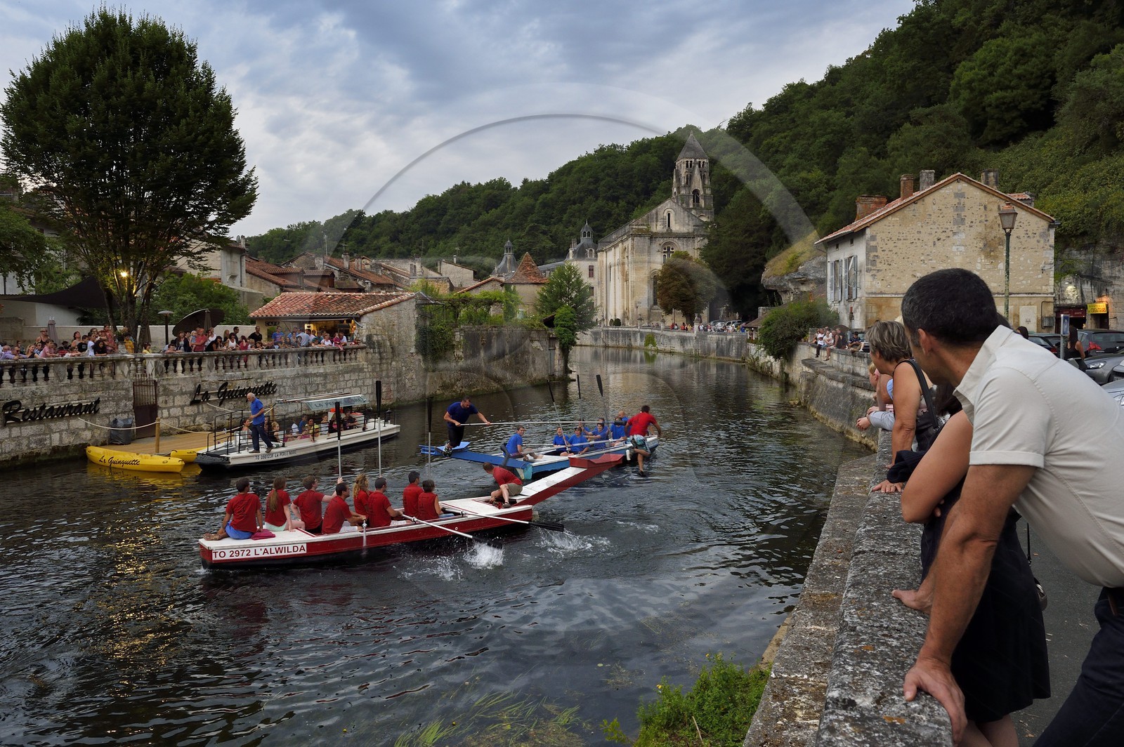 France, Dordogne, Brantome, water jousting on the Dronne river and Saint Pierre benedictine abbey