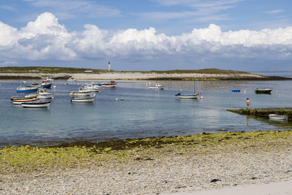France, Finistère, Iroise Sea, Molene Island, the port beach and the Ledenez Vraz islet in the background