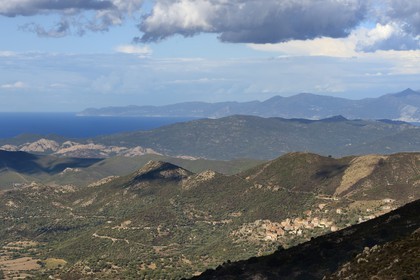 France, Haute Corse, Balagne, perched village of Belgodere, the Cap Corse in the background