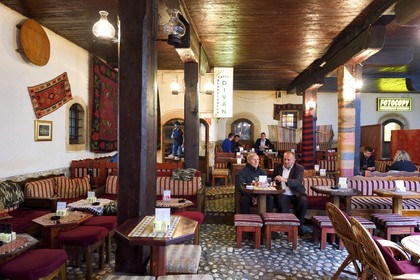 Bosnia and Herzegovina, Sarajevo, Bascarsija district in the old town, men at the Morica Han Café