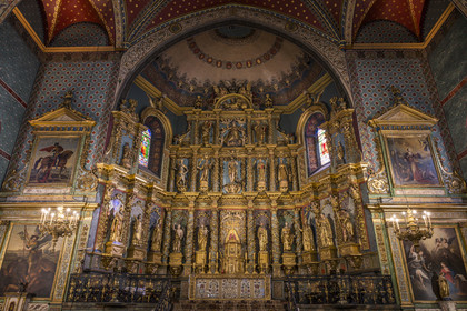France, Pyrenees Atlantiques, Basque Country, Saint Jean de Luz, the Saint-Jean-Baptiste (Saint John the Baptist) Church, 17th century altarpiece in gilded wood and the wooden galleries of the nave