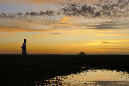 France, Manche, Bay of Mont Saint Michel, listed as World Heritage by UNESCO, Mont Saint Michel at sunset