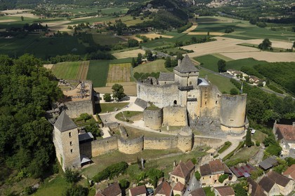France, Dordogne, Perigord Noir, Dordogne Valley, Castelnaud la Chapelle, labelled Les Plus Beaux Villages de France (The Most Beautiful Villages of France), Castelnaud Castle on a cliff above the Dordogne valley (aerial view)
