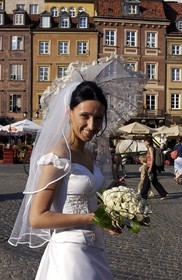 Poland, Warsaw, just married women on the market place of the old town