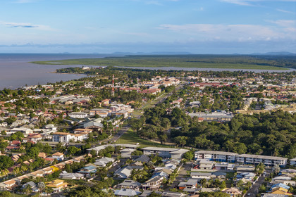 France, French Guiana, the city of Kourou, the mouth of the Kourou river in the background (aerial view)