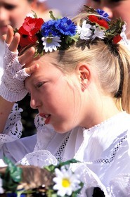 France, Haut Rhin, Eguisheim village, labelled Les Plus Beaux Villages de France (The Most Beautiful Villages of France), wine celebration, girl in traditional costume and crown